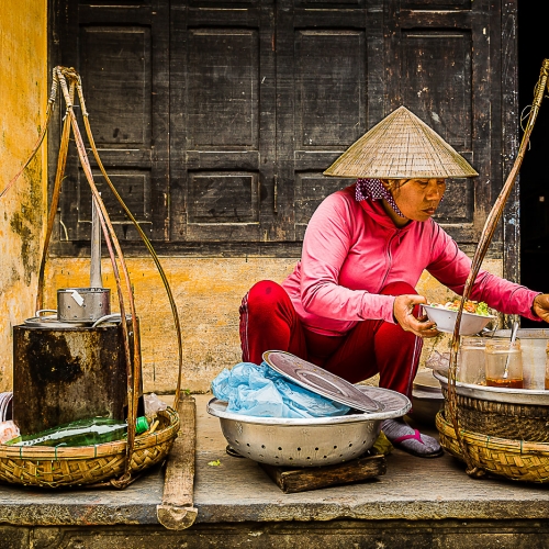 Silver Medal - Guy P. Larin's image "Vietnamese Street Vendor"